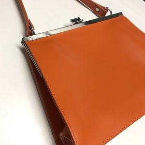 Wilson’s Leather Maxima Orange Purse